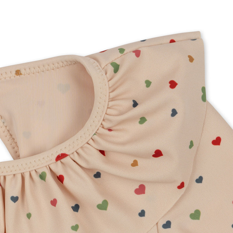 MANUCA LS FRILL SWIMSUIT-MULTI HEARTS