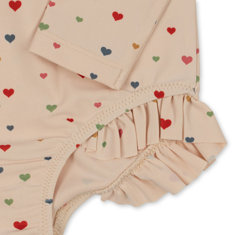 MANUCA LS FRILL SWIMSUIT-MULTI HEARTS